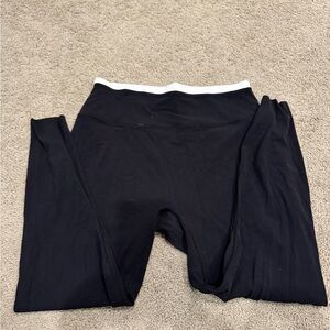 TWO pairs of Leggings one with White Waistband & second pair of all black